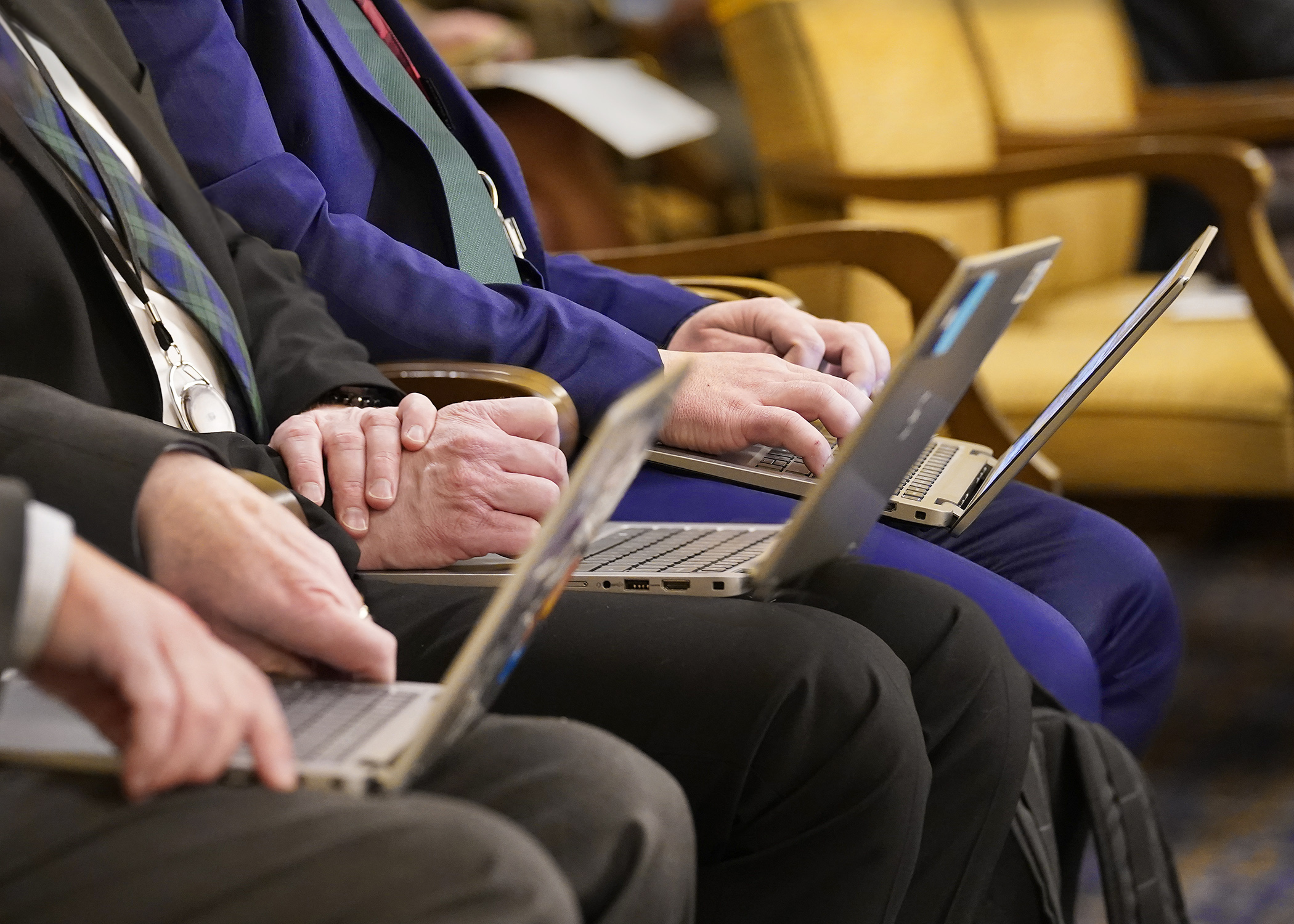 Laptop computers have become a common tool for committee attendees. (Photo by Andrew VonBank) 